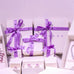Duavaa jewellery gift boxes with purple ribbon and assorted pieces in white packaging – Duavaa