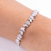 White diamante CZ tennis bracelet with pear and round stones worn on wrist – Duavaa