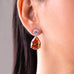Orange citrine pear teardrop drop earring with round CZ stud worn on the ear – Duavaa