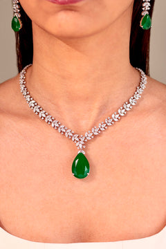 Emerald green teardrop pendant set with CZ necklace and drop earrings worn on model – Duavaa