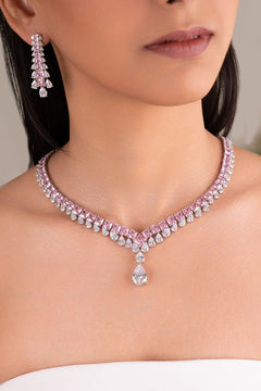 Pink necklace with crystal pear drop pendant worn on neck – Duavaa