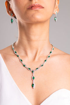 Green marquise-cut CZ and crystal necklace and drop earrings worn on neck and ear – Duavaa