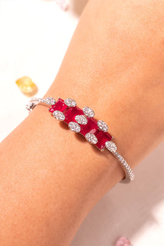 Red princess-cut stone cuff bracelet with CZ accents worn on wrist – Duavaa