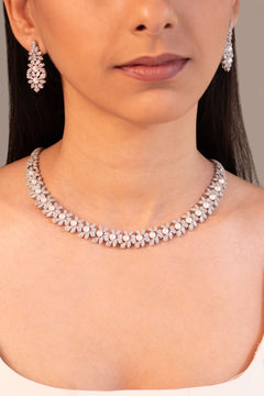 Silver-tone crystal and pearl floral necklace and drop earring set worn on model – Duavaa