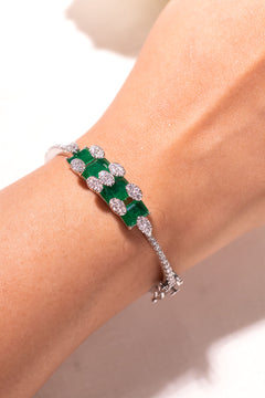 Emerald green princess-cut stone cuff bracelet with CZ accents on wrist – Duavaa