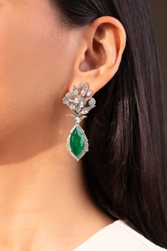 Emerald green marquise-cut crystal drop earring with CZ halo worn on the ear – Duavaa